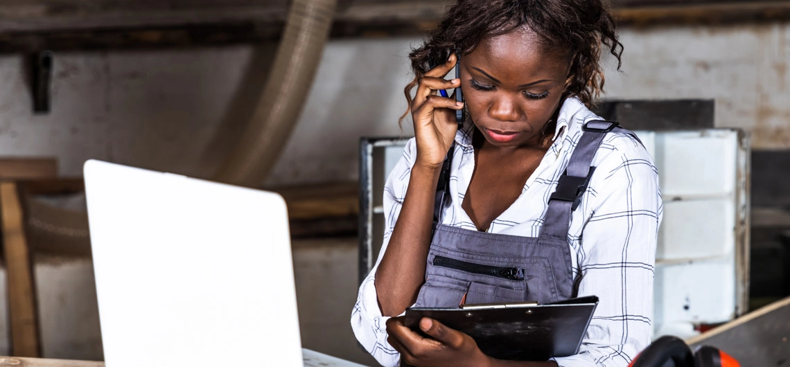 A small business owner uses Accounting Software