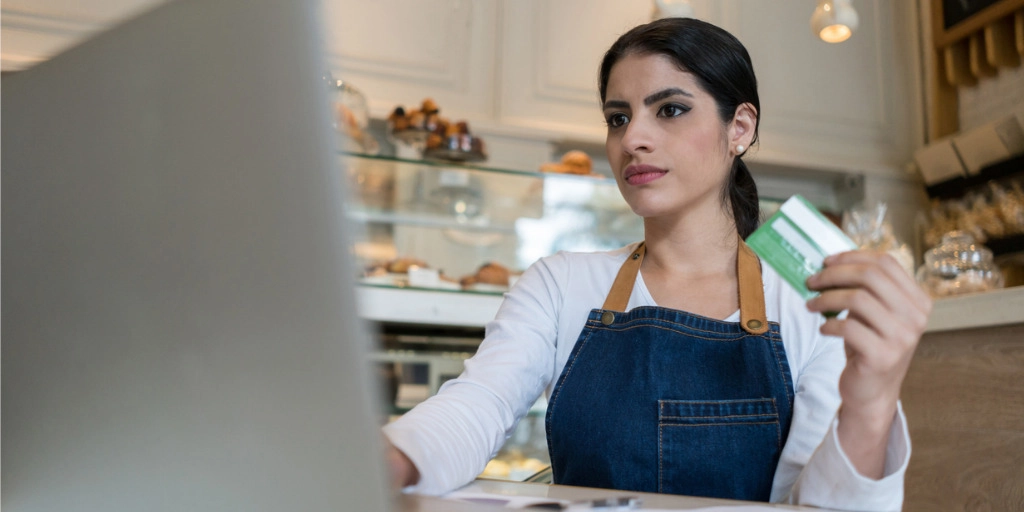 small business owner uses business credit card