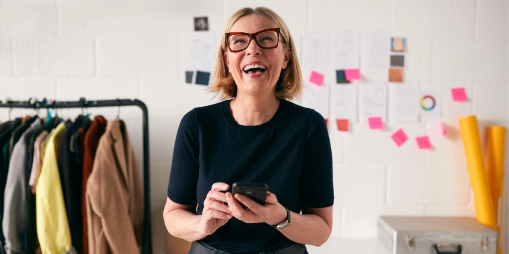 Small business owner uses business budgeting apps