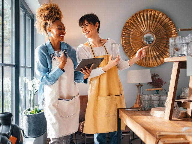 Small business owners use two business cards that report to credit bureaus.