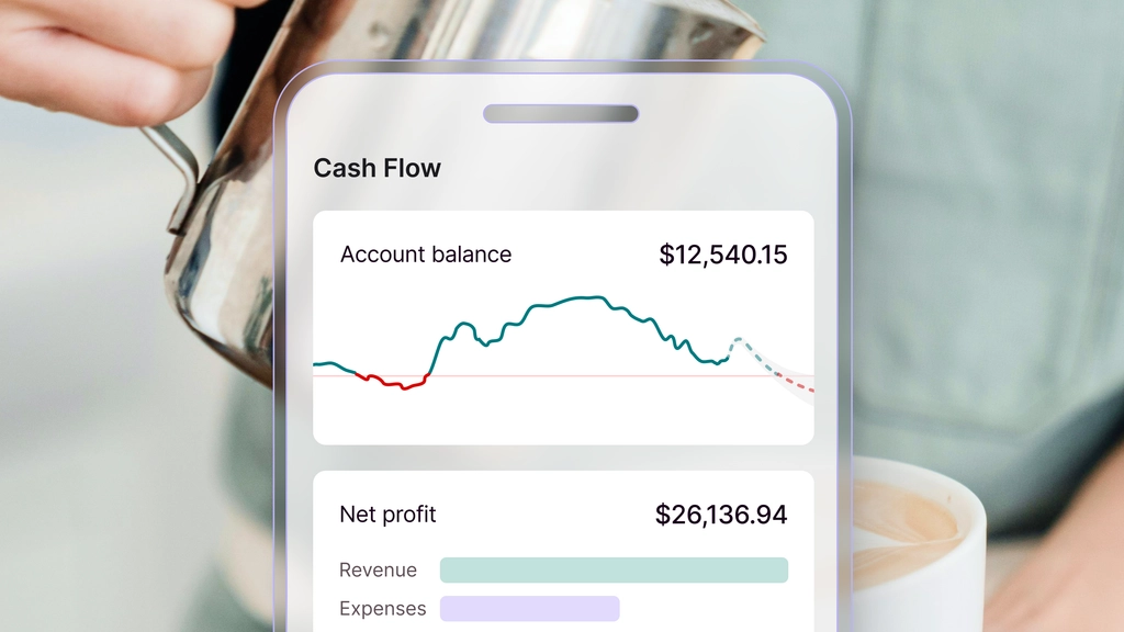 Mobile screen showing cash flow summary with account balance of $12,540.15, a line graph of balance trends, and net profit of $26,136.94 with revenue and expenses bars          Ask ChatGPT
