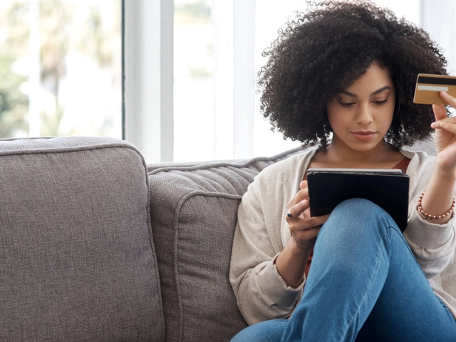 small business owner calculates her debt-service coverage ratio
