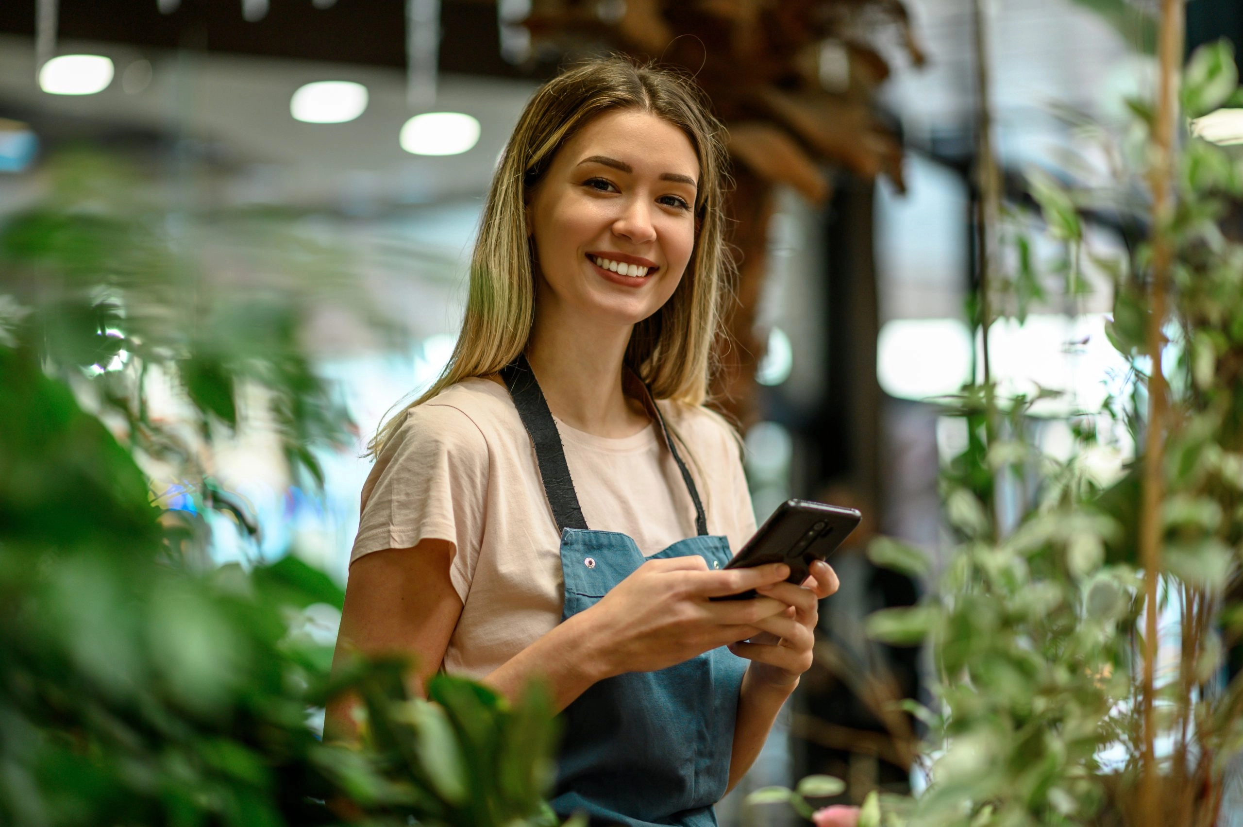 business owner running payroll on phone
