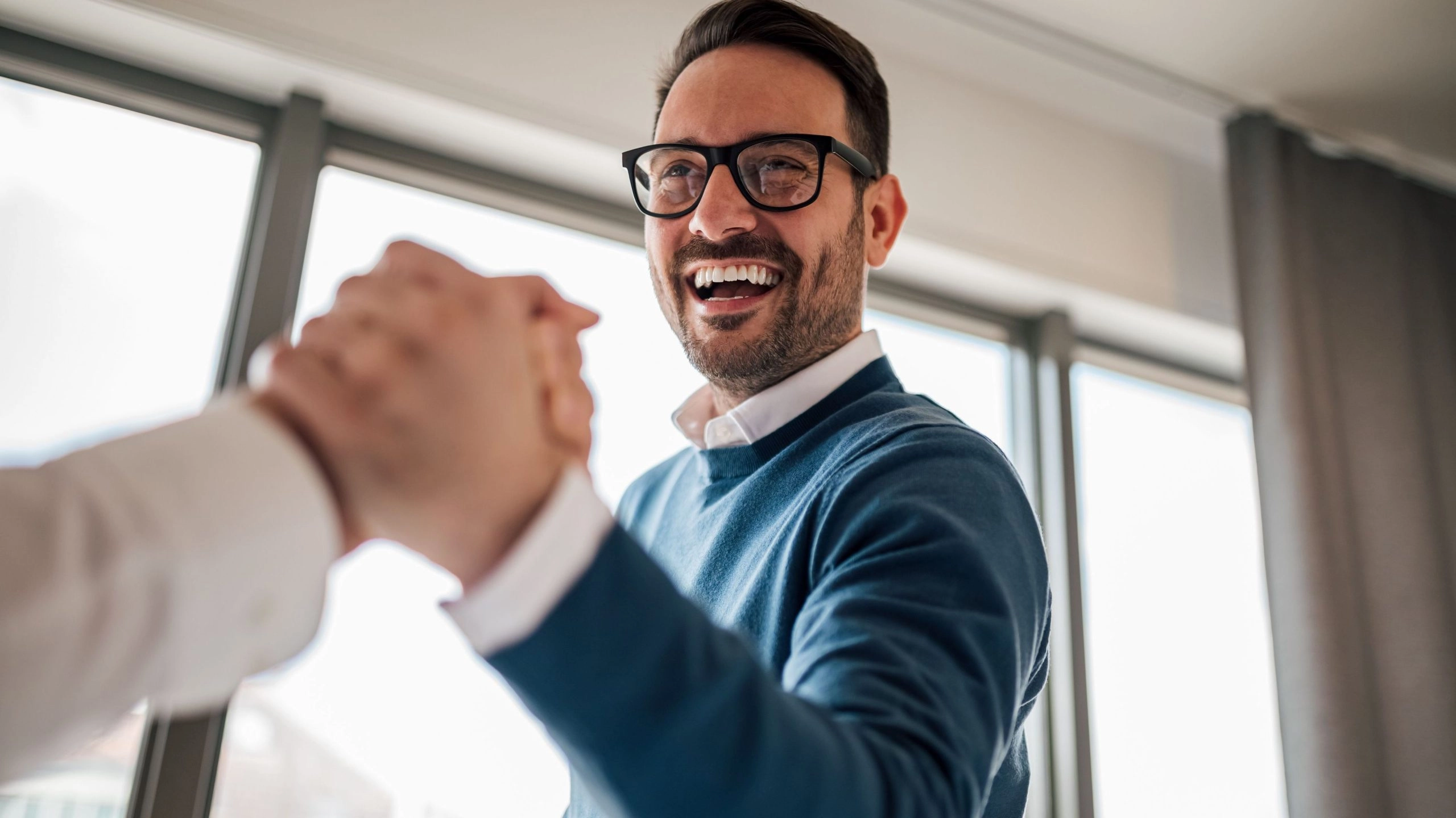 business owner excited about solving cash flow problems