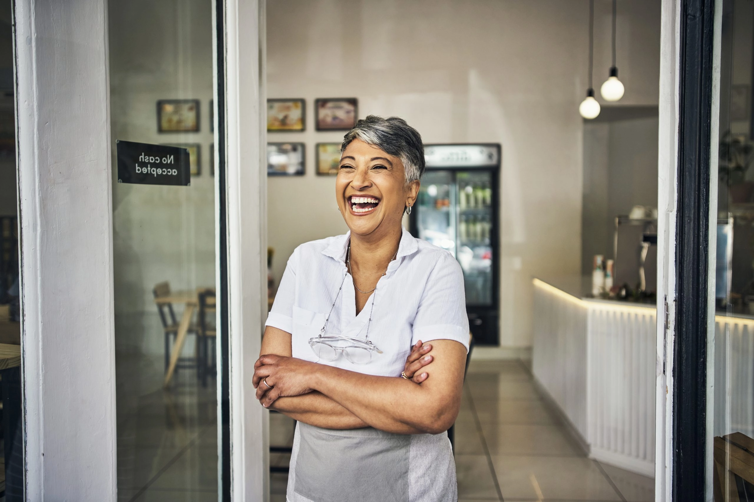 Female business owner smiling after getting tradelines fast