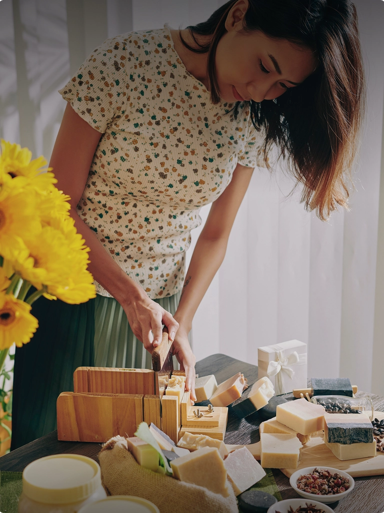business owner cutting up bars of soap