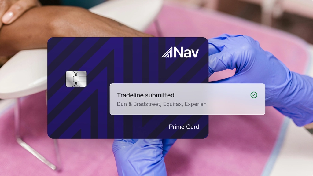 Nav Prime Card with a notification reading 'Tradeline submitted to Dun & Bradstreet, Equifax, Experian' shown over a background of a person receiving a manicure          Ask ChatGPT