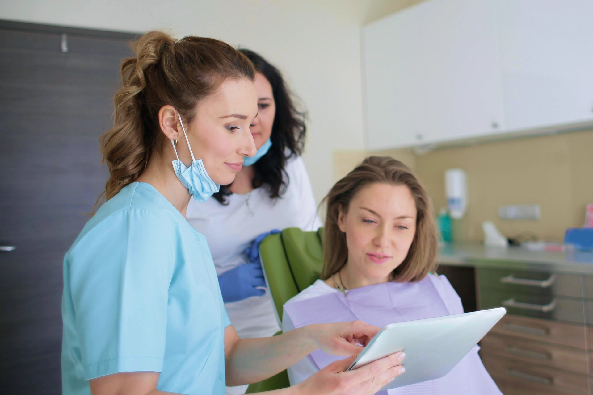 healthcare professional consulting with a patient