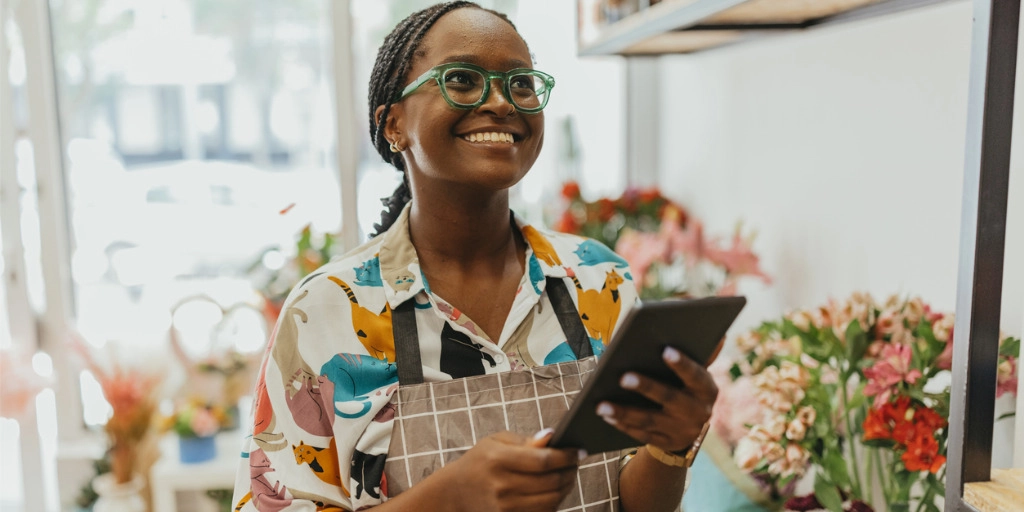 Small business owner uses a new business credit card for growth.