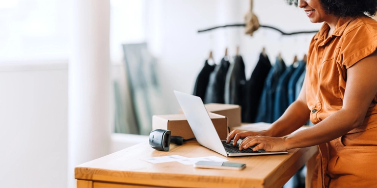 Small business owner manages payroll records.