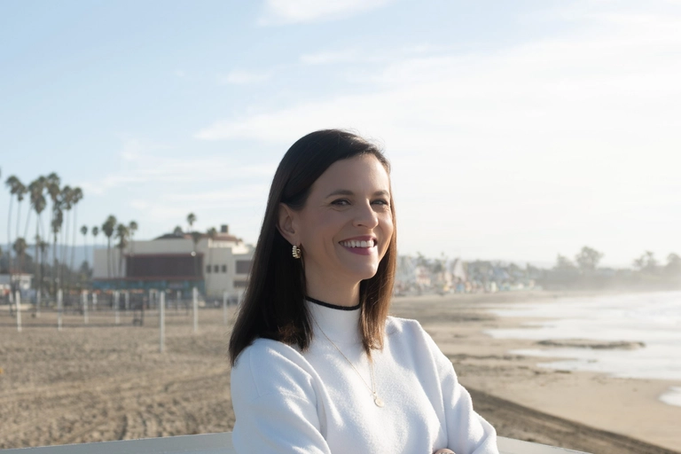 Raquel Alexander, CMO of Nav, headshot on beach