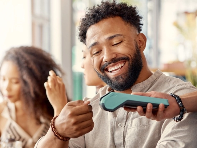 Customer paying with a credit card at a restaurant